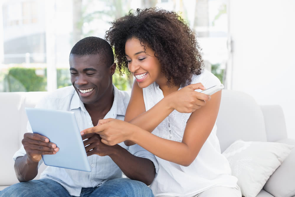 Couple looking at iPad